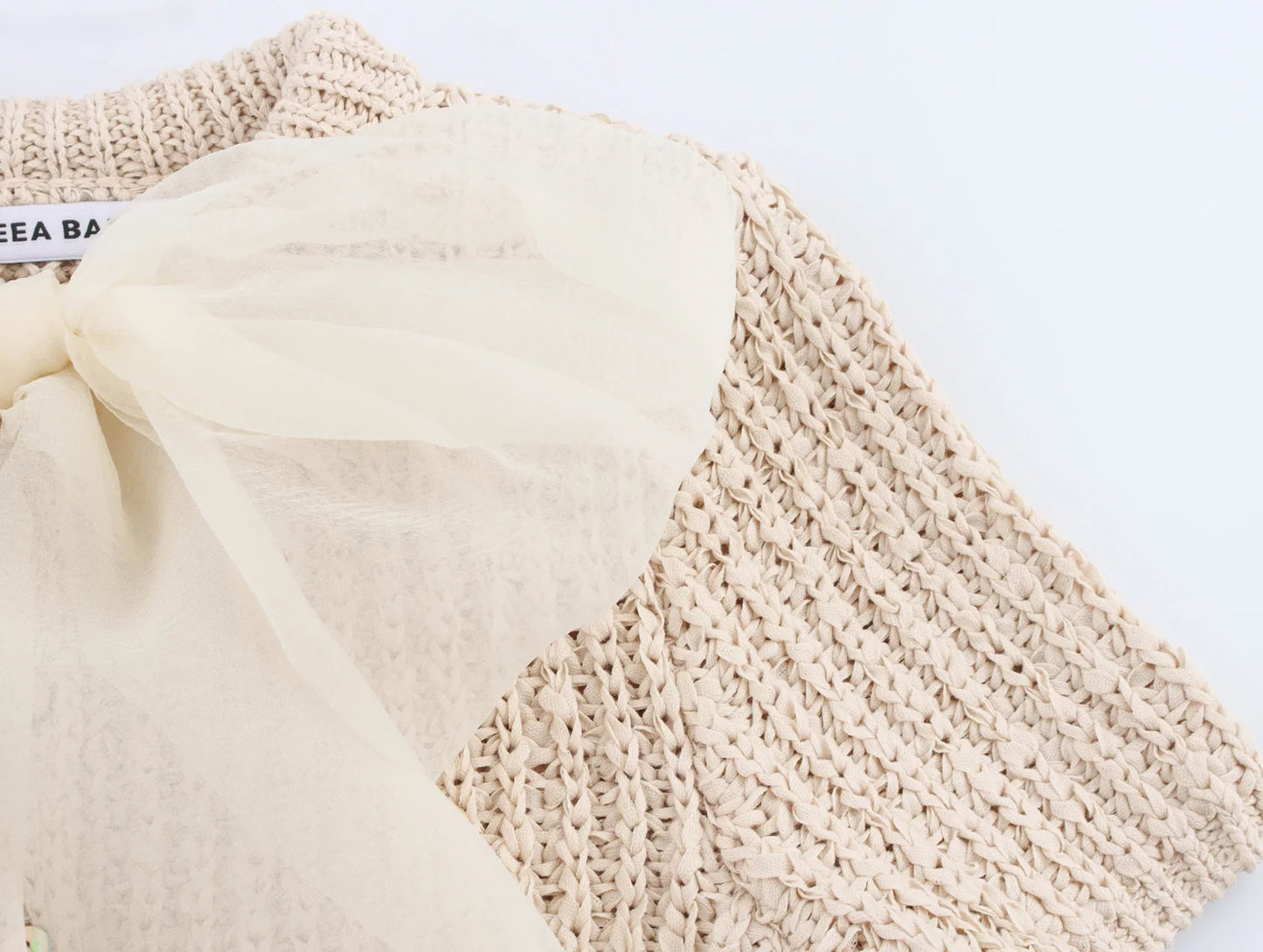 Spring 2025 new women's wear: Sweet transparent tulle bow decorated short-sleeved knitted top