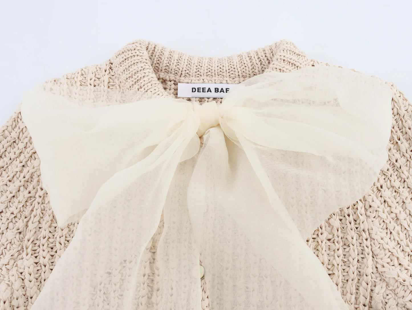 Spring 2025 new women's wear: Sweet transparent tulle bow decorated short-sleeved knitted top